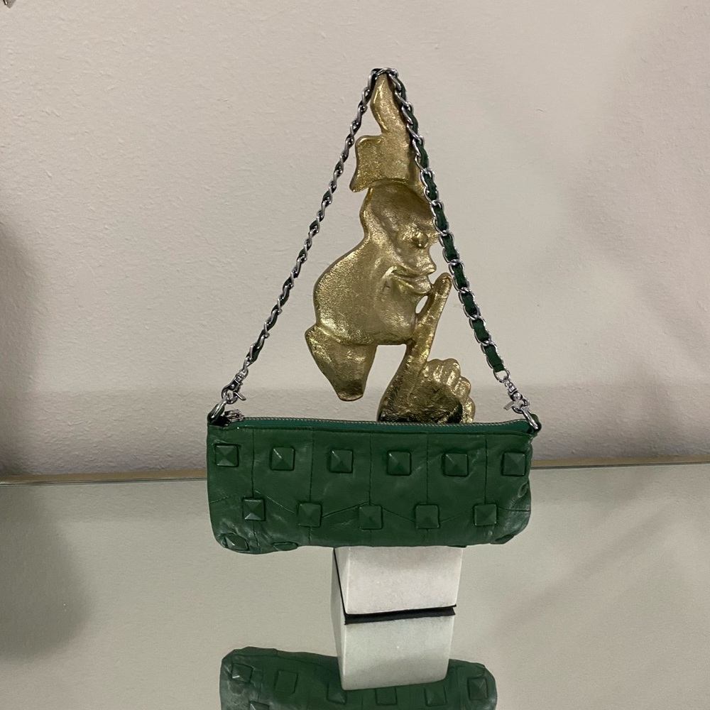 Women’s green leather shoulder bag by 7CHI. Beautiful inside and out.